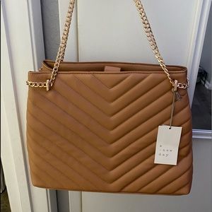 Brand new purse with tags